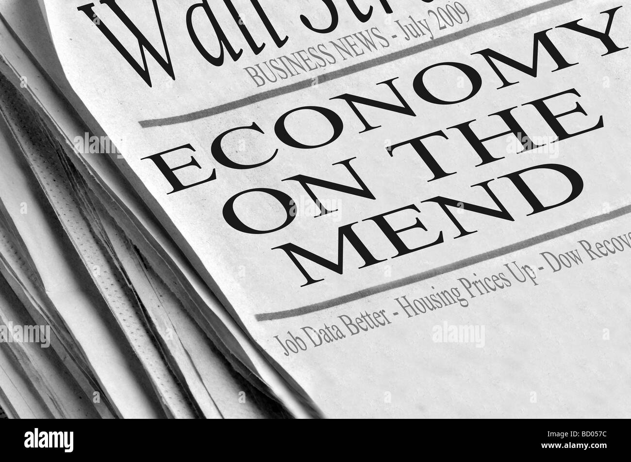Economia del Mend - titoli di giornale che si diffondono ottimismo circa l'economia. Foto Stock