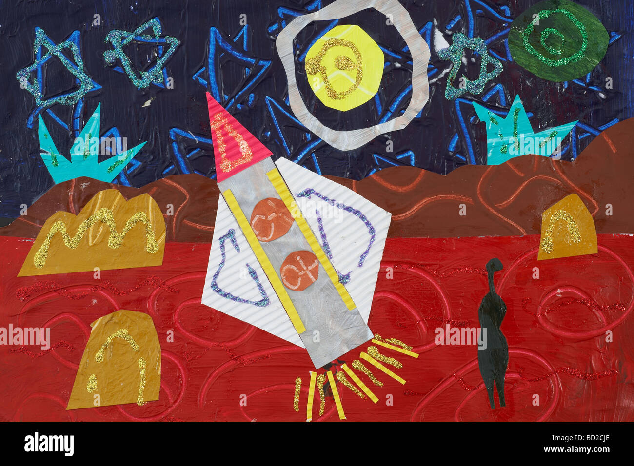 Bambino s disegno e montaggio di un razzo lancio nello spazio esterno Foto Stock