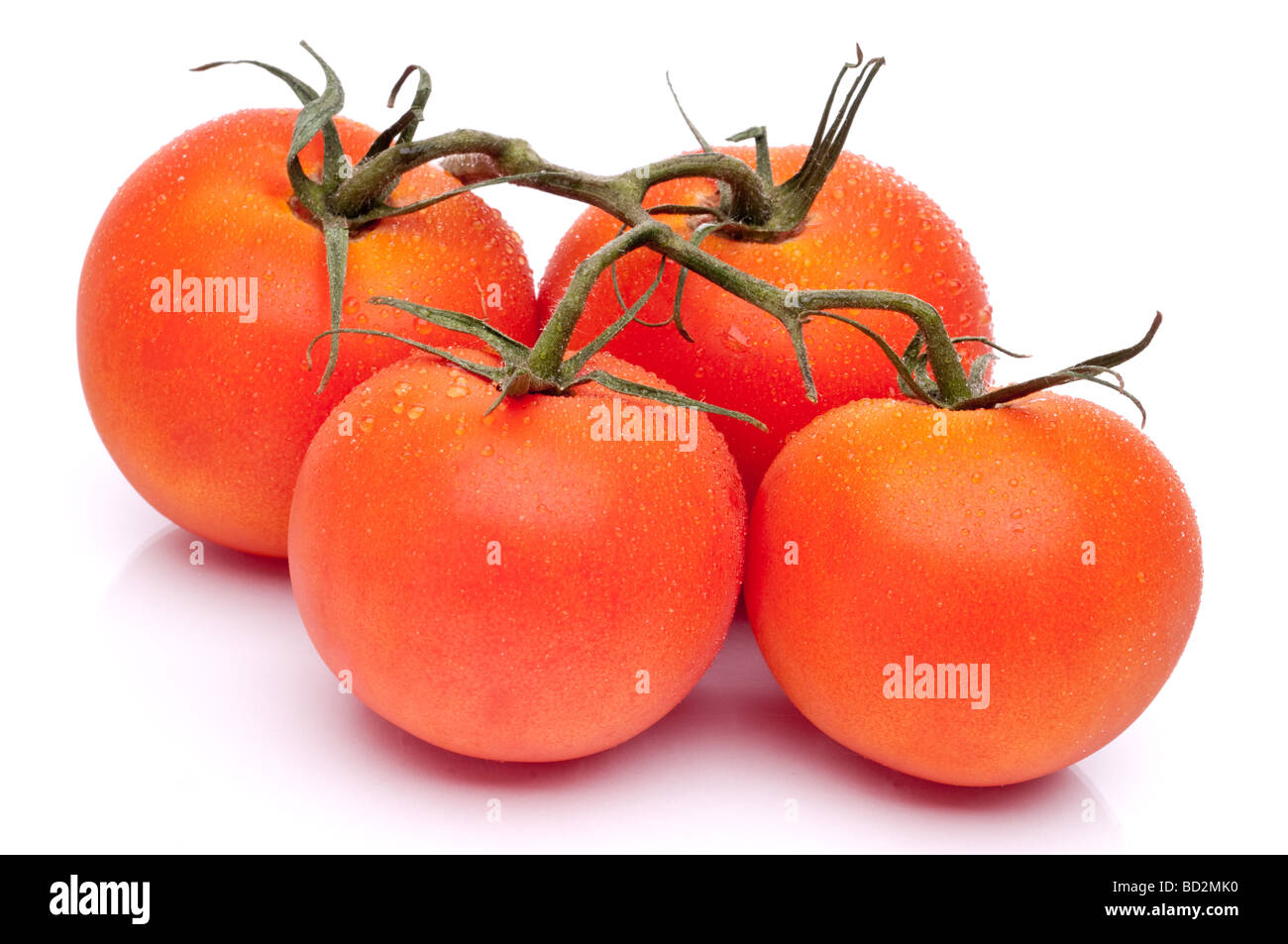 L'immagine orizzontale di 4 pomodori freschi maturi Foto Stock