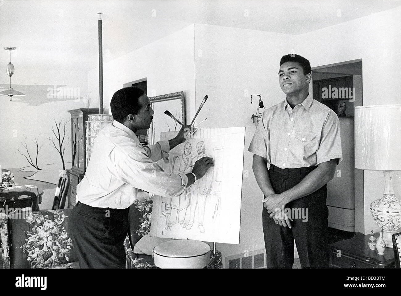 MUHAMMAD ALI è disegnata da suo padre Cassio,artista commerciale in casa loro a Louiseville Kentucky, circa 1965 Foto Stock