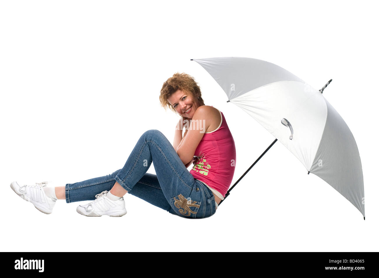 Oggetto sullo sport bianco donna con ombrello Foto Stock