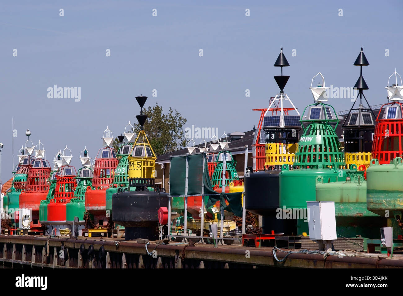Navigation buoys dockside in Vlissingen harbour Foto Stock