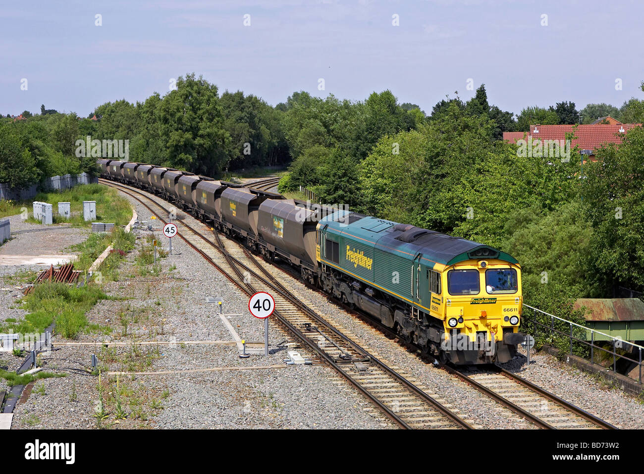 Freightliner 66611 passa Asteria Hotel giunzione con un vuoto di carbone in treno da Rugeley sul percorso di Bescto per eseguire il round 29 06 09 Foto Stock