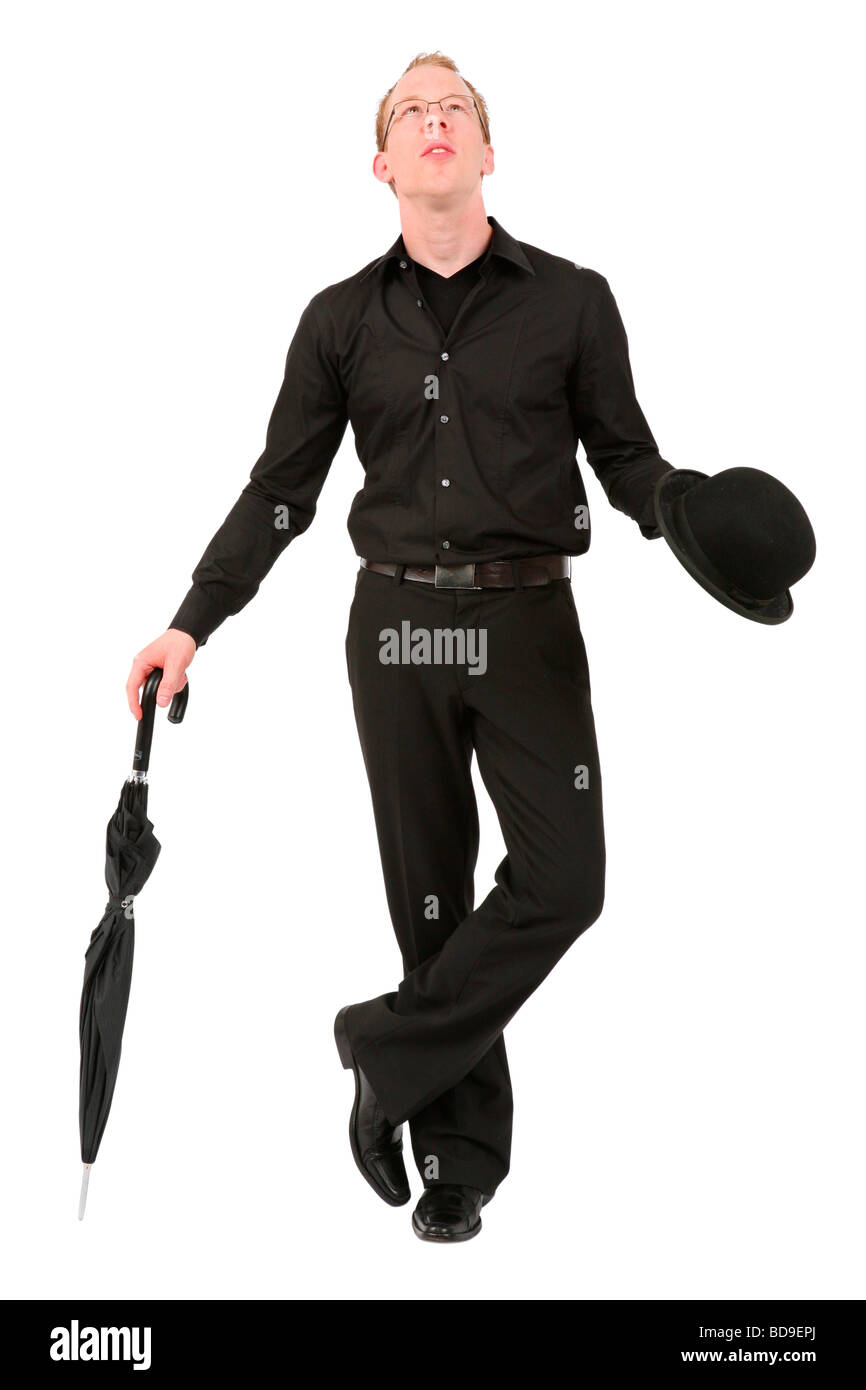 Giovane Uomo con ombrello e cappello bowler in attesa per la pioggia Foto  stock - Alamy