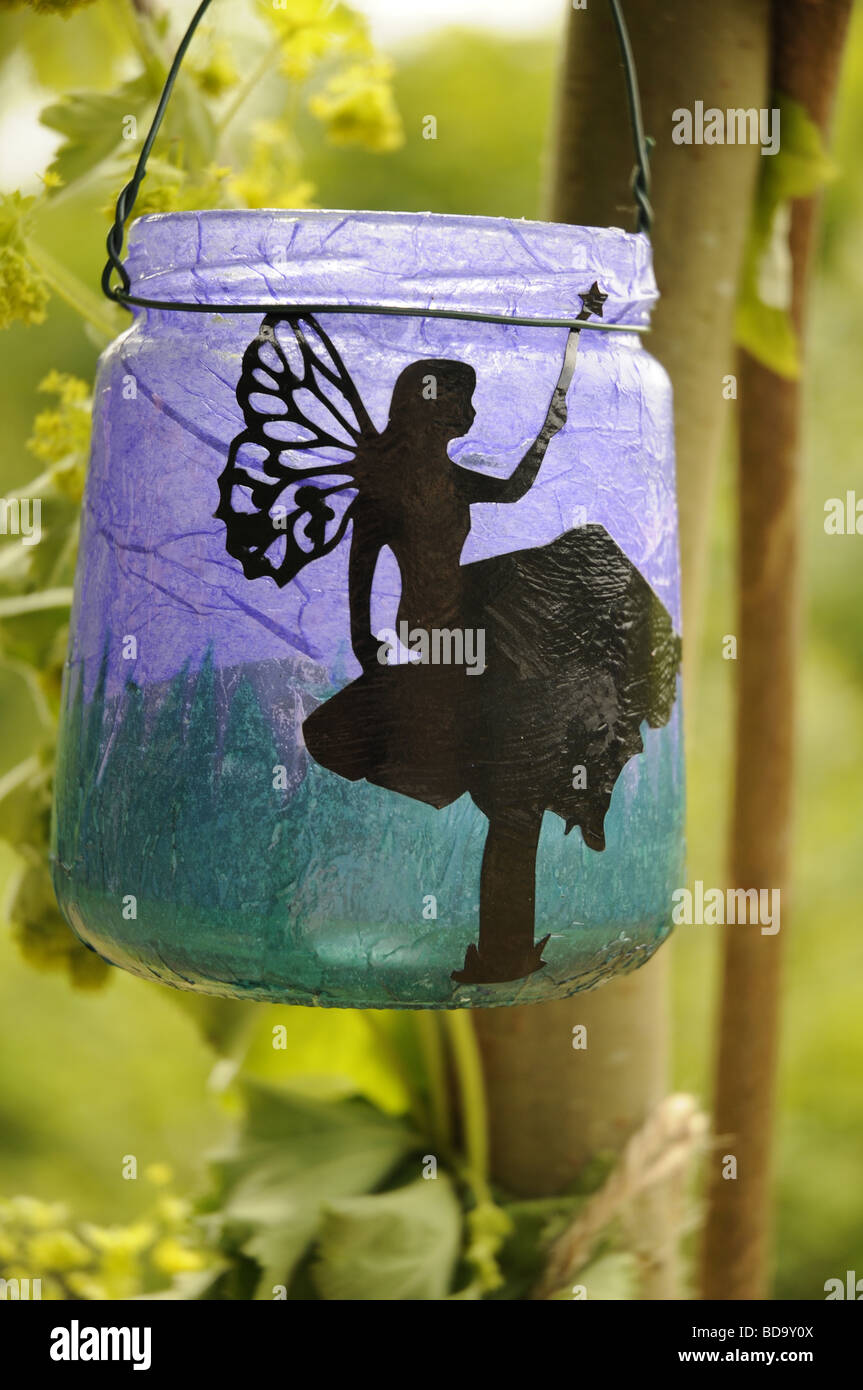 Vetro vasetto di marmellata decorate con fata silhouette. Foto Stock