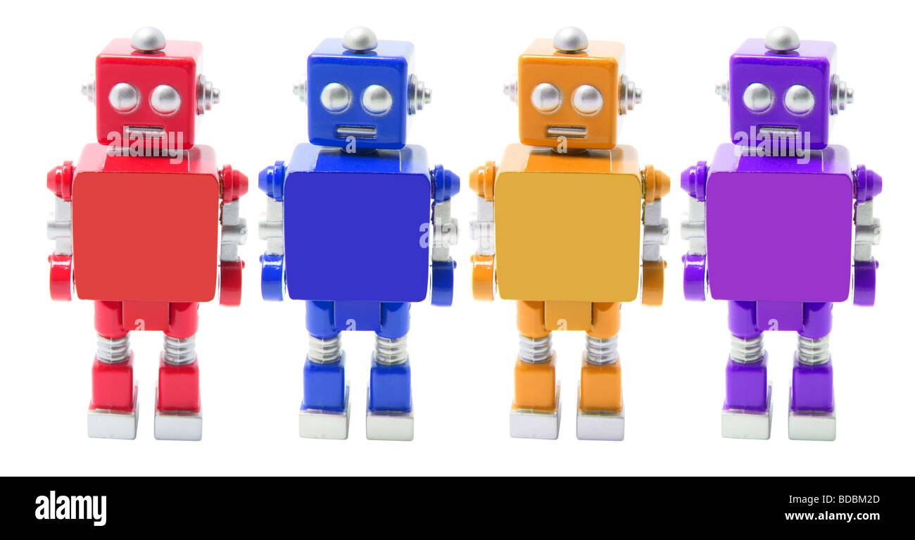 Fila di colorati robot giocattolo Foto Stock