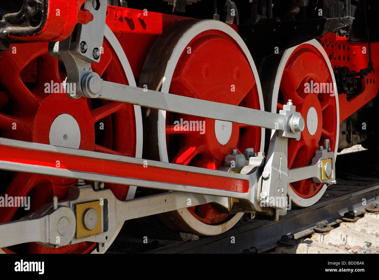 Red ruote di ferro del retro locomotiva a vapore Foto Stock Red ruote di ferro del retro locomotiva a vapore Foto Stock