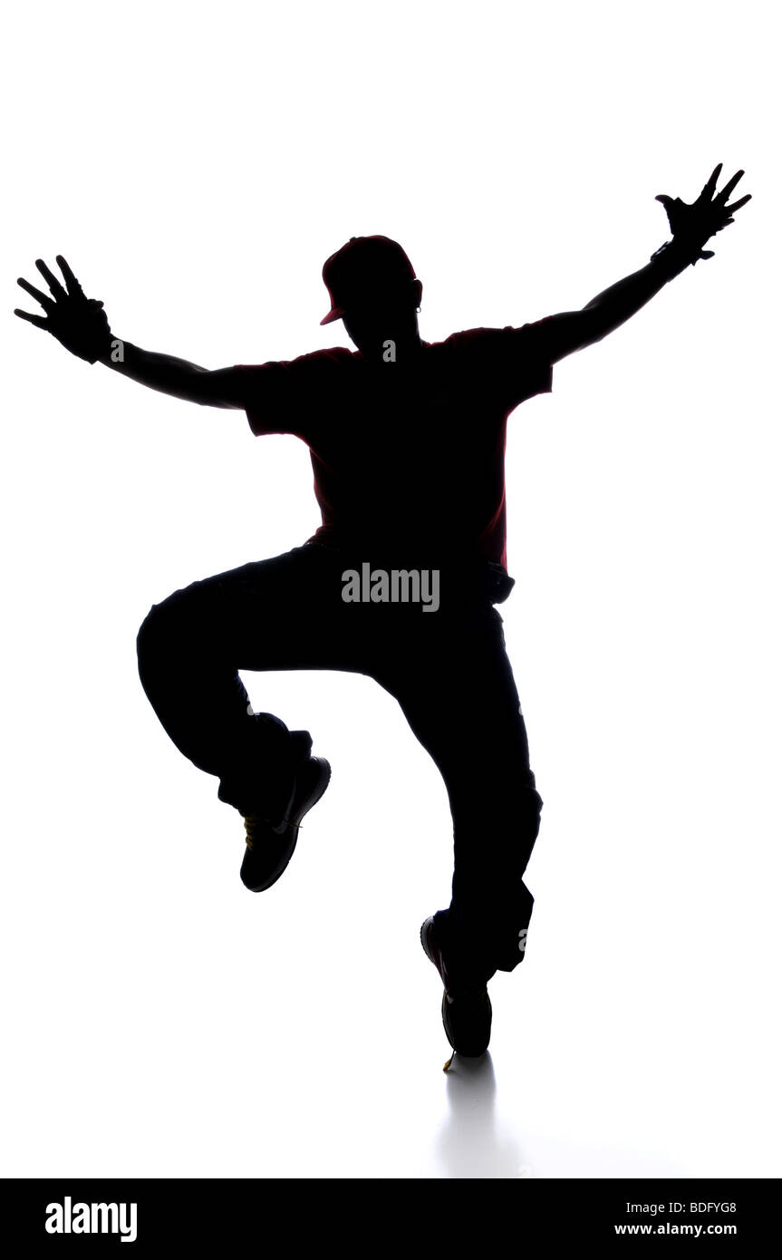 Silhouette di un giovane uomo breakdance isolato su bianco Foto Stock