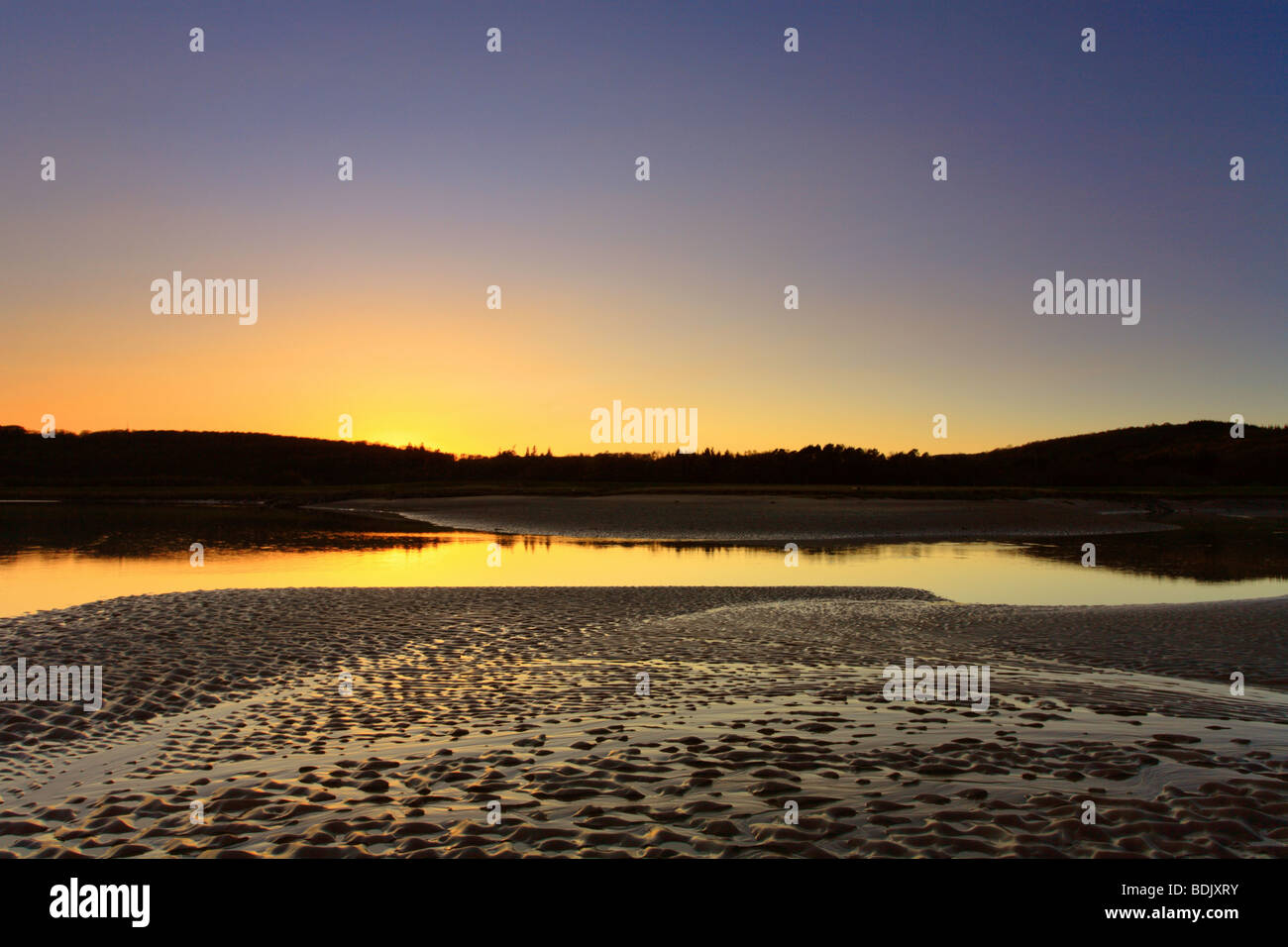 Sunset 'fiume Leven' Greenodd, Lake District, Cumbria. Estuario e velme, impostazione sun. Foto Stock