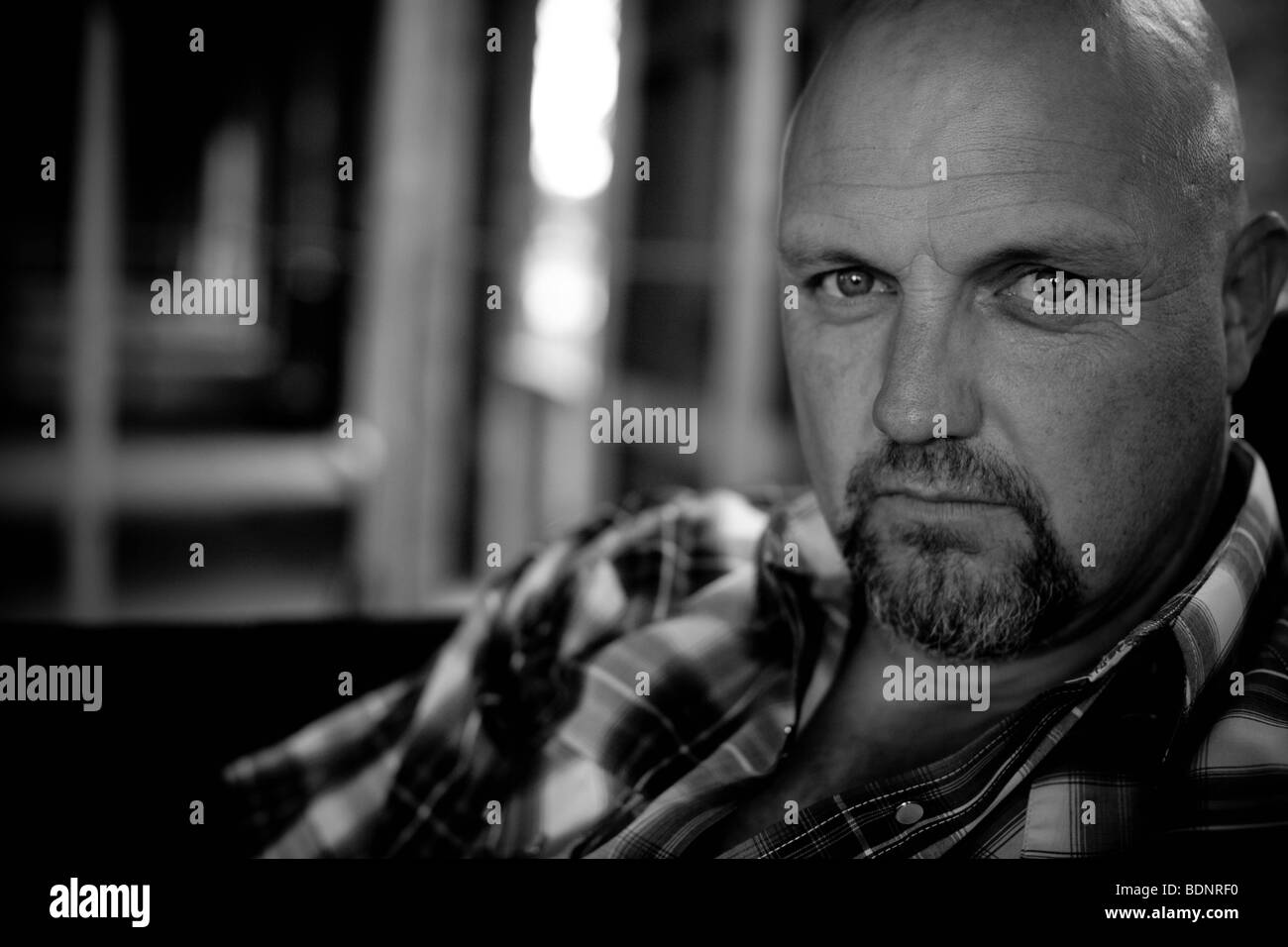 Bianco e nero ritratto di uomo maturo con pizzetto Foto Stock