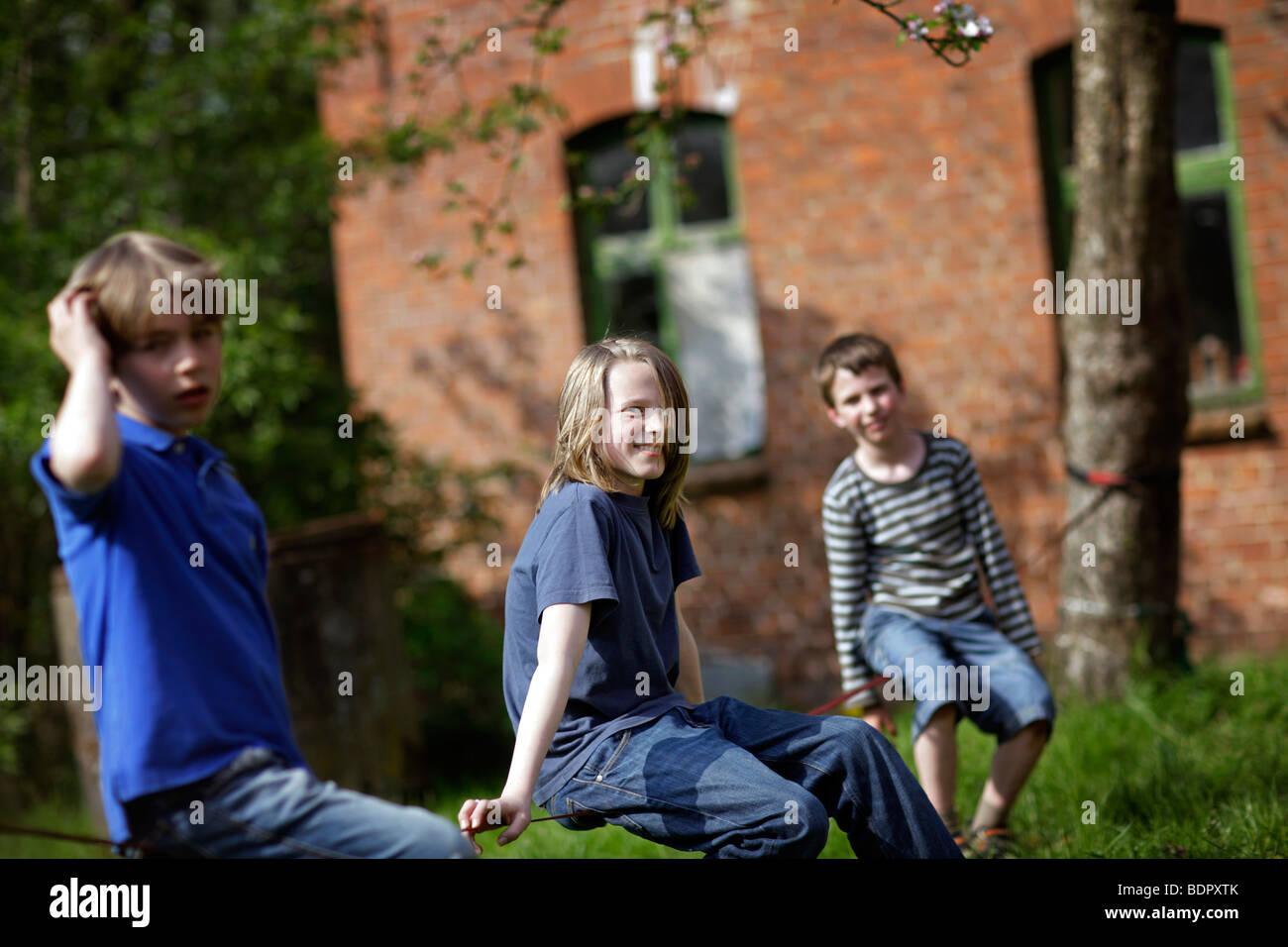 Tre ragazzi Foto Stock