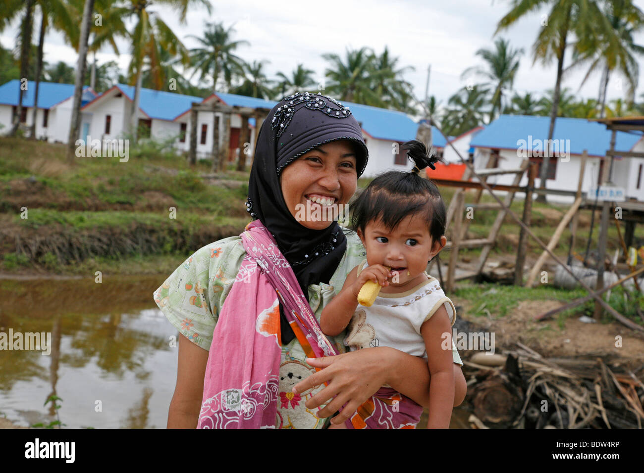 INDONESIA CRS progetto di alloggiamento a Seunebok Tuengoh reinsediamento. Meulaboh, Aceh, due anni dopo lo Tsunami. Foto Stock
