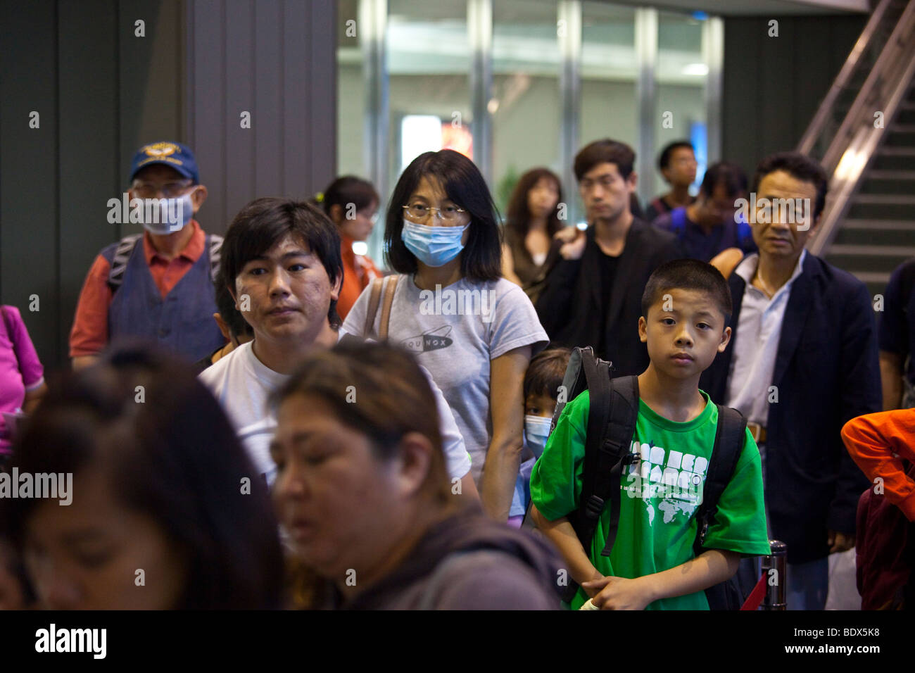 Preoccupato di influenza suina in NRT Narita Airport in Giappone Foto Stock