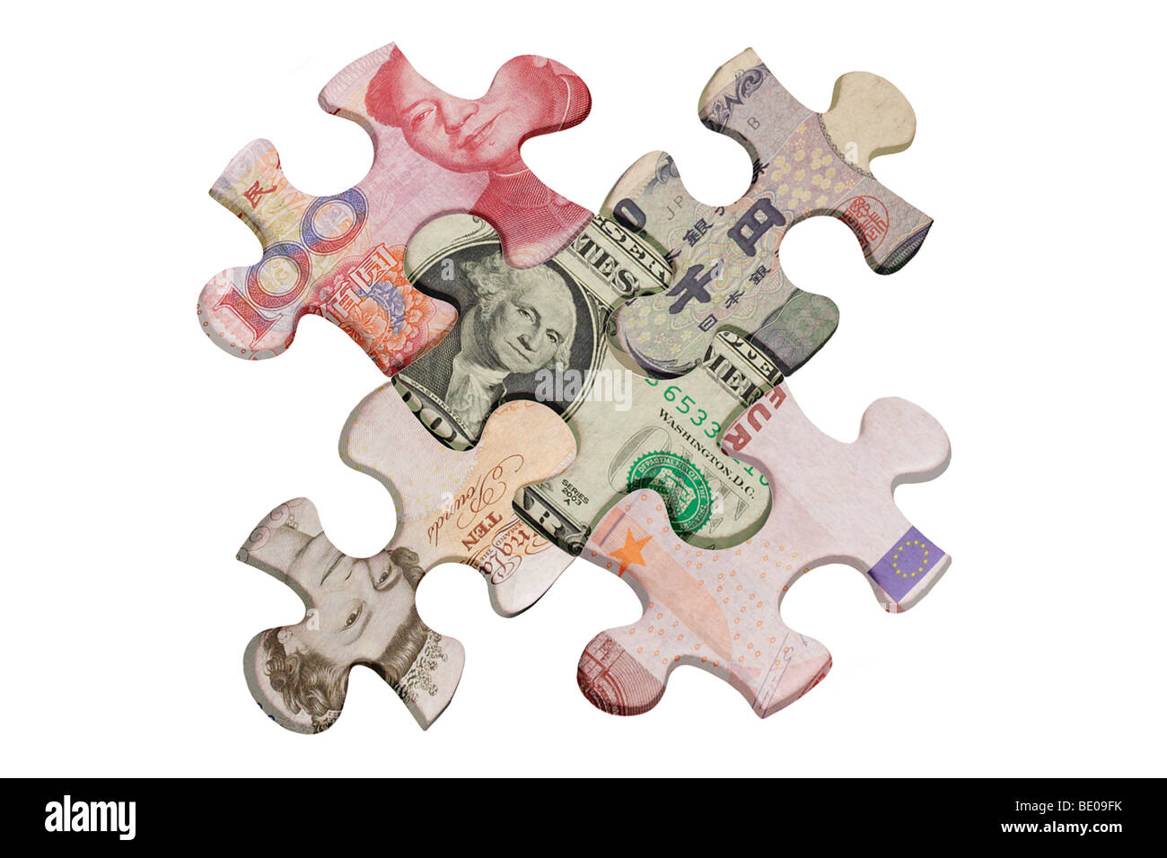 I puzzle sovrapposte con valute mondiali Foto Stock