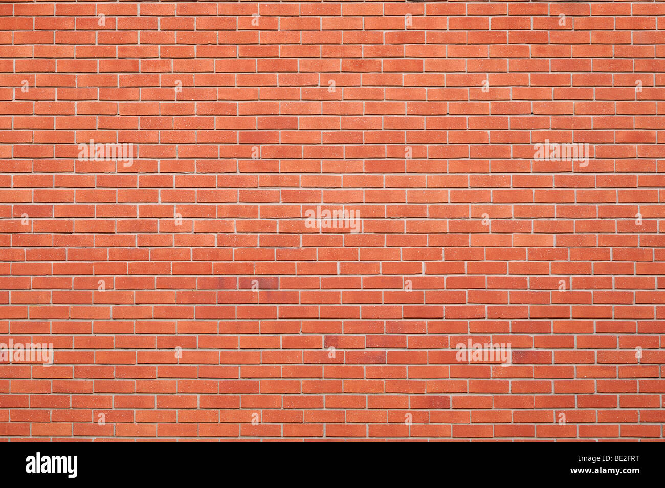 Un muro di mattoni, vicino. Foto Stock