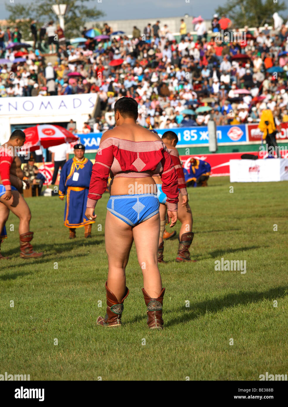 Il lottatore a Naadam festival al National Sports Stadium, Ulaanbaatar, in Mongolia Foto Stock
