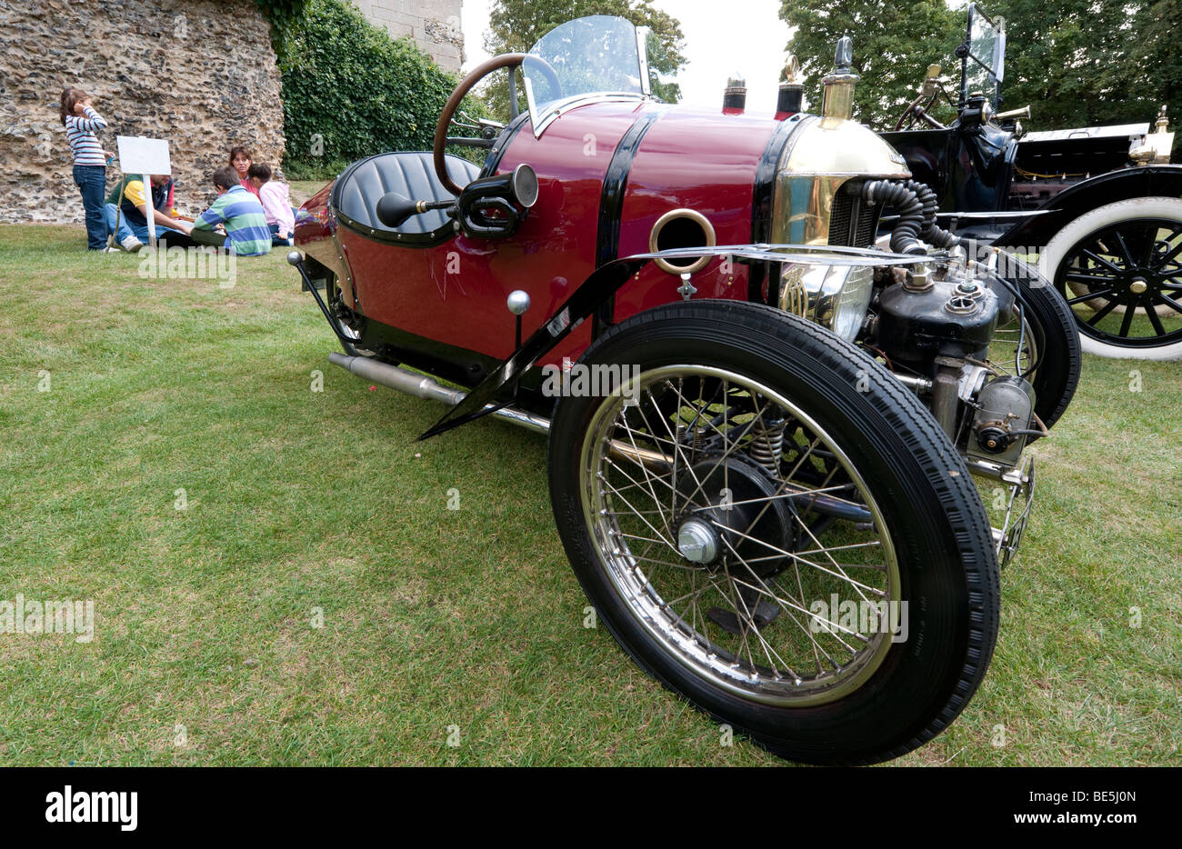 Un 1920's Morgan Darmont 3 auto a ruote. In un classico auto rally presso il Castello di Hedingham, Essex, Regno Unito. Vettura inglese fabbricato a Parigi. Foto Stock