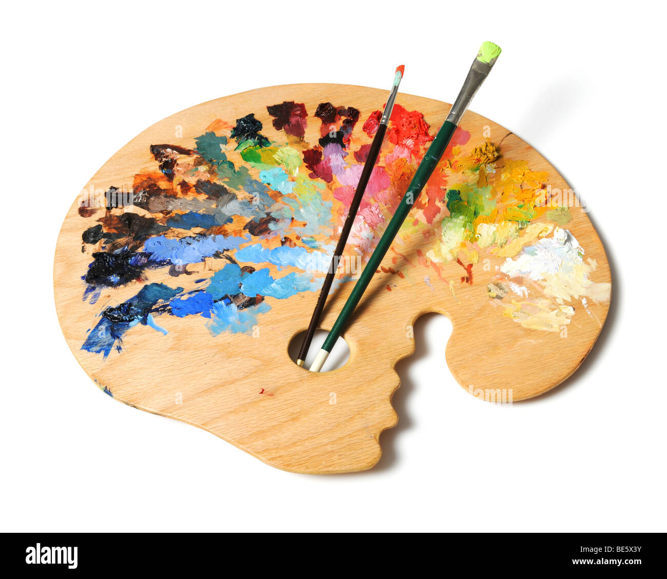 Artista ergonomica della tavolozza con spazzole isolate su uno sfondo bianco Foto Stock