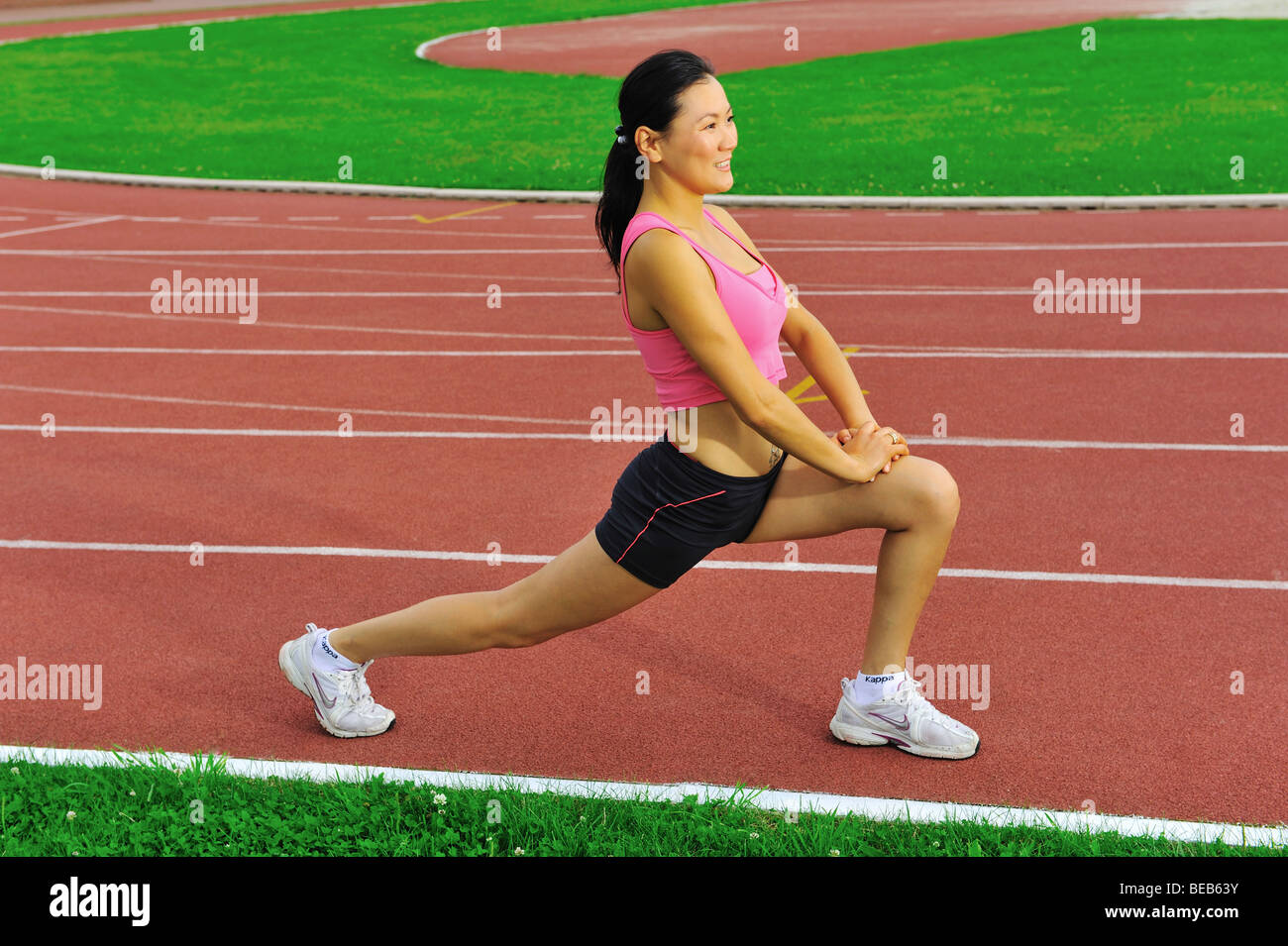 Runner preparandosi alla gara,codice sportivo Foto Stock