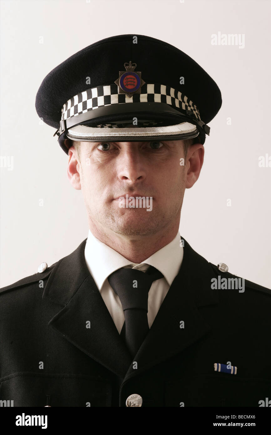 British poliziotto su sfondo semplice Foto Stock