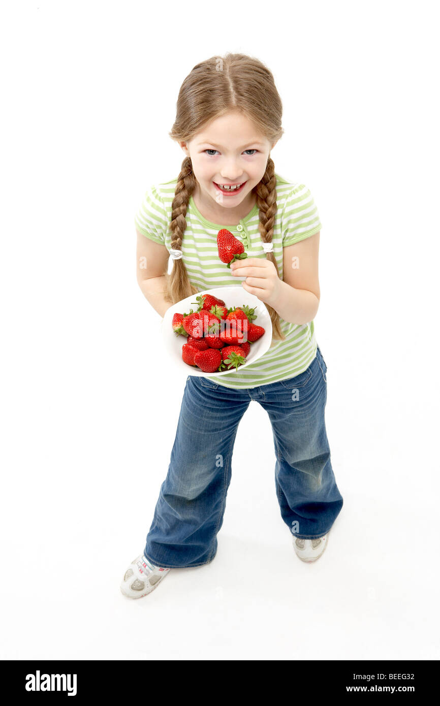 Un simpatico 1 anno vecchia bambina con gli occhi blu che indossa jeans e  sorridente rosa contro un bianco puro (255) dello sfondo Foto stock - Alamy