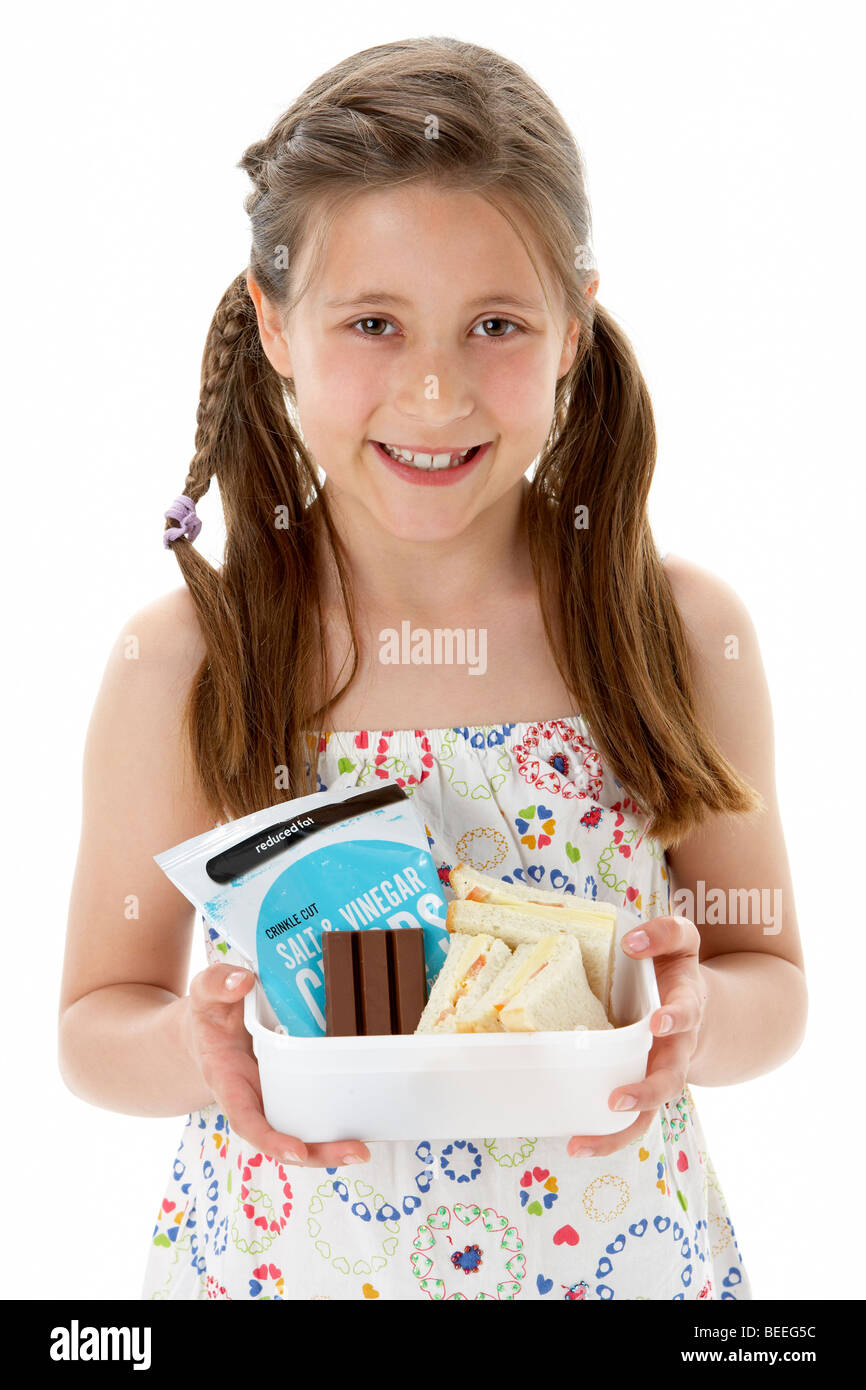 Ritratto in studio della ragazza sorridente Holding Lunchbox Foto Stock
