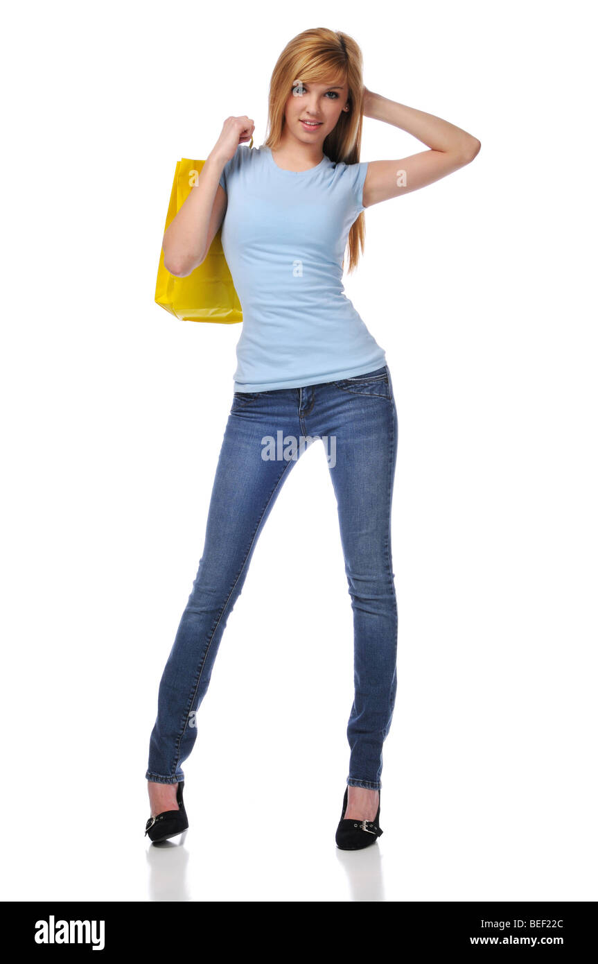 Young Teen con shopping bag isolato su uno sfondo bianco Foto Stock