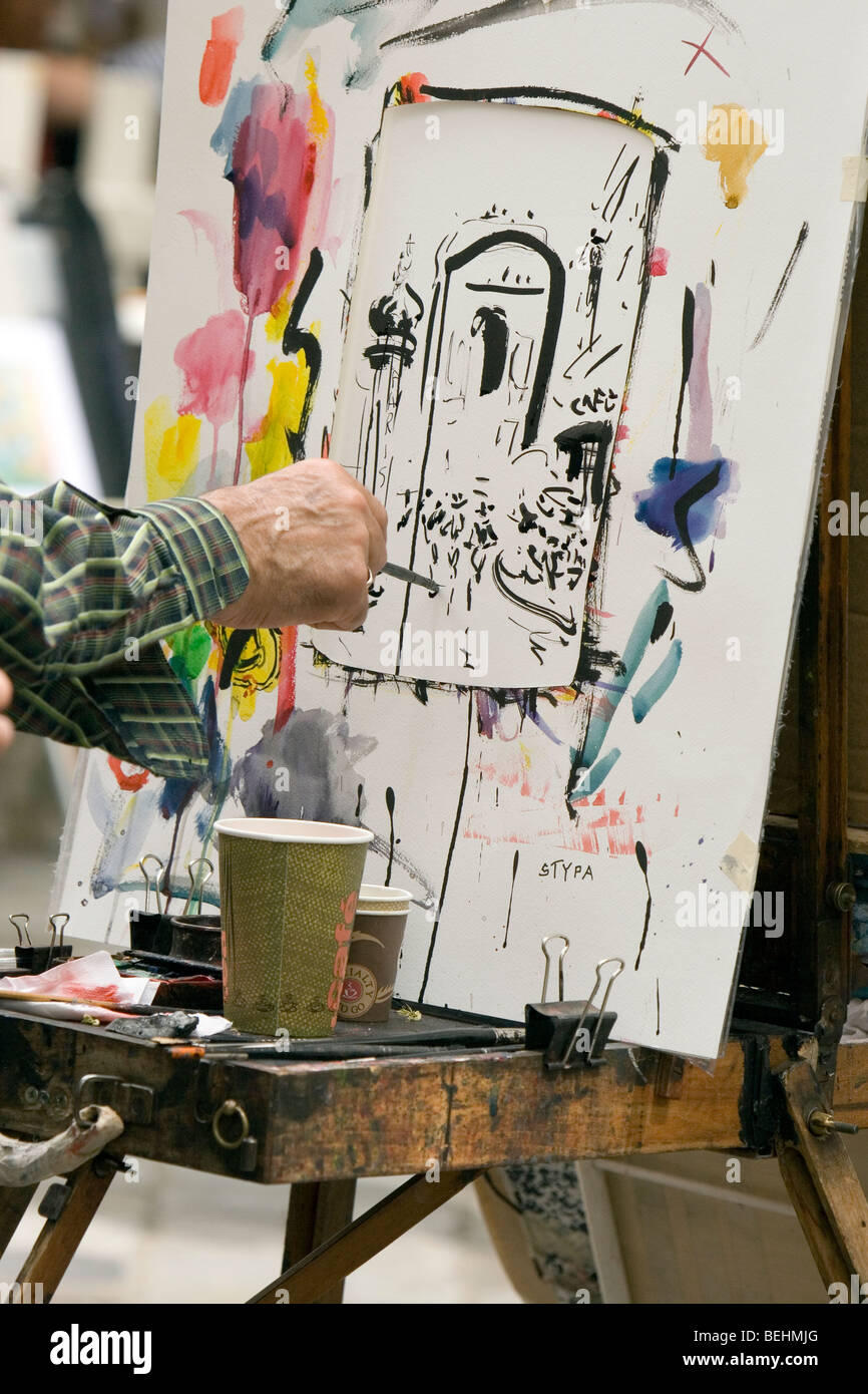 L'artista di strada disegno nel quartiere di Montmartre, Parigi, Francia Foto Stock