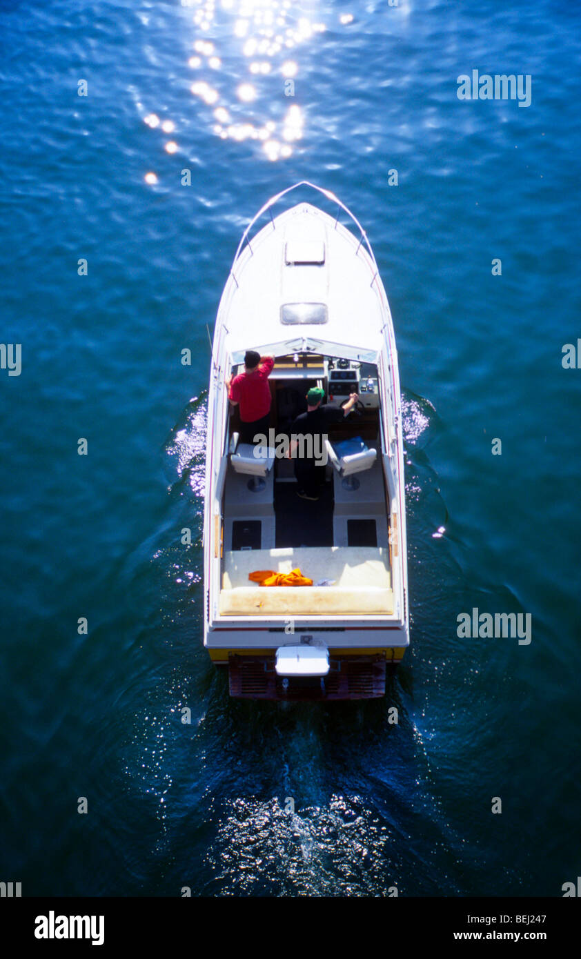 Sun ricreazione sport aria fresca ride sterzare partono lasciare la velocità del motore Avviare vista aerea due coppia persone Timone sterzo guida orologio Foto Stock