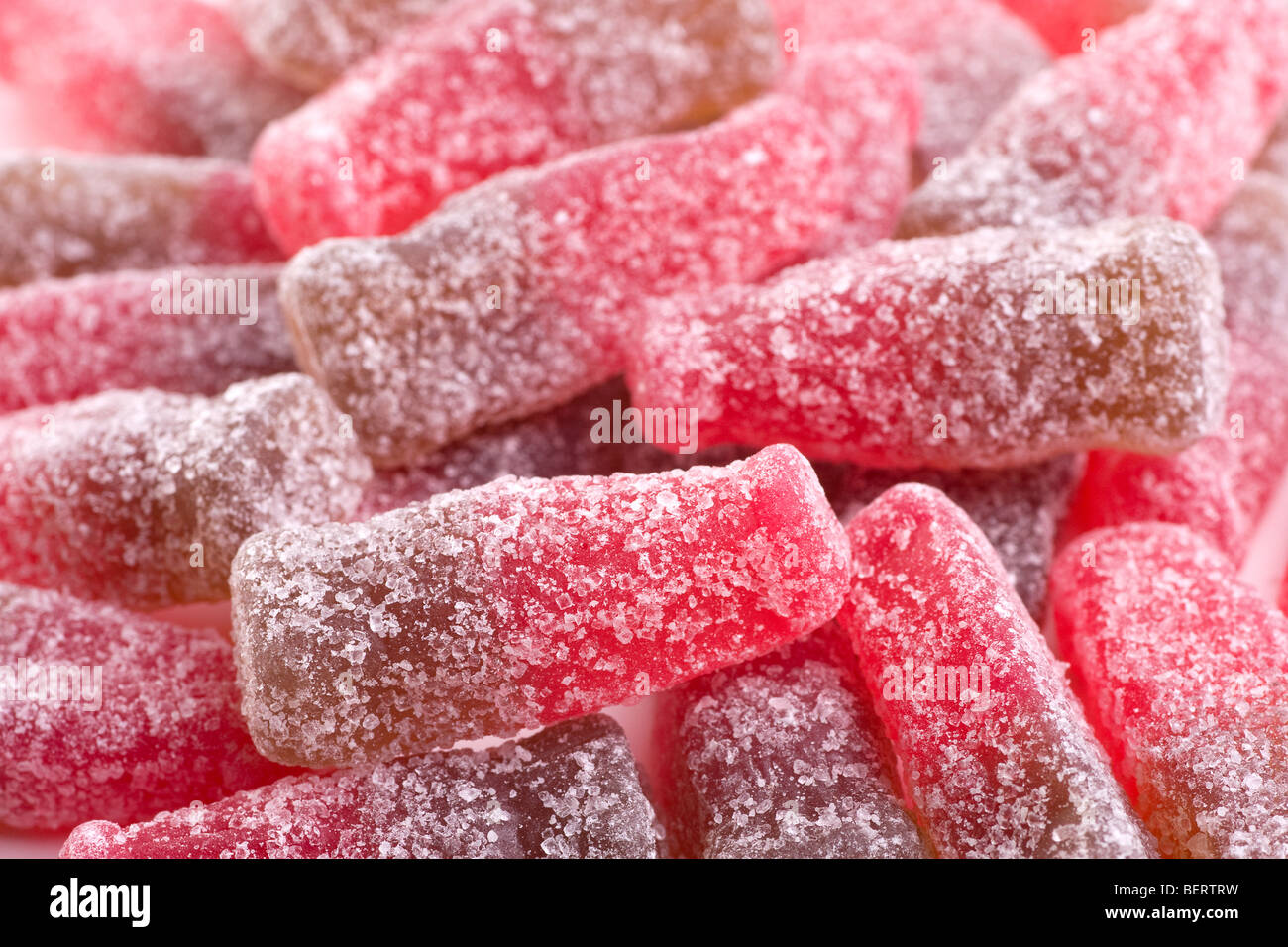 Ciliegia frizzante bottiglia di Cola caramelle: Close-Up Foto Stock