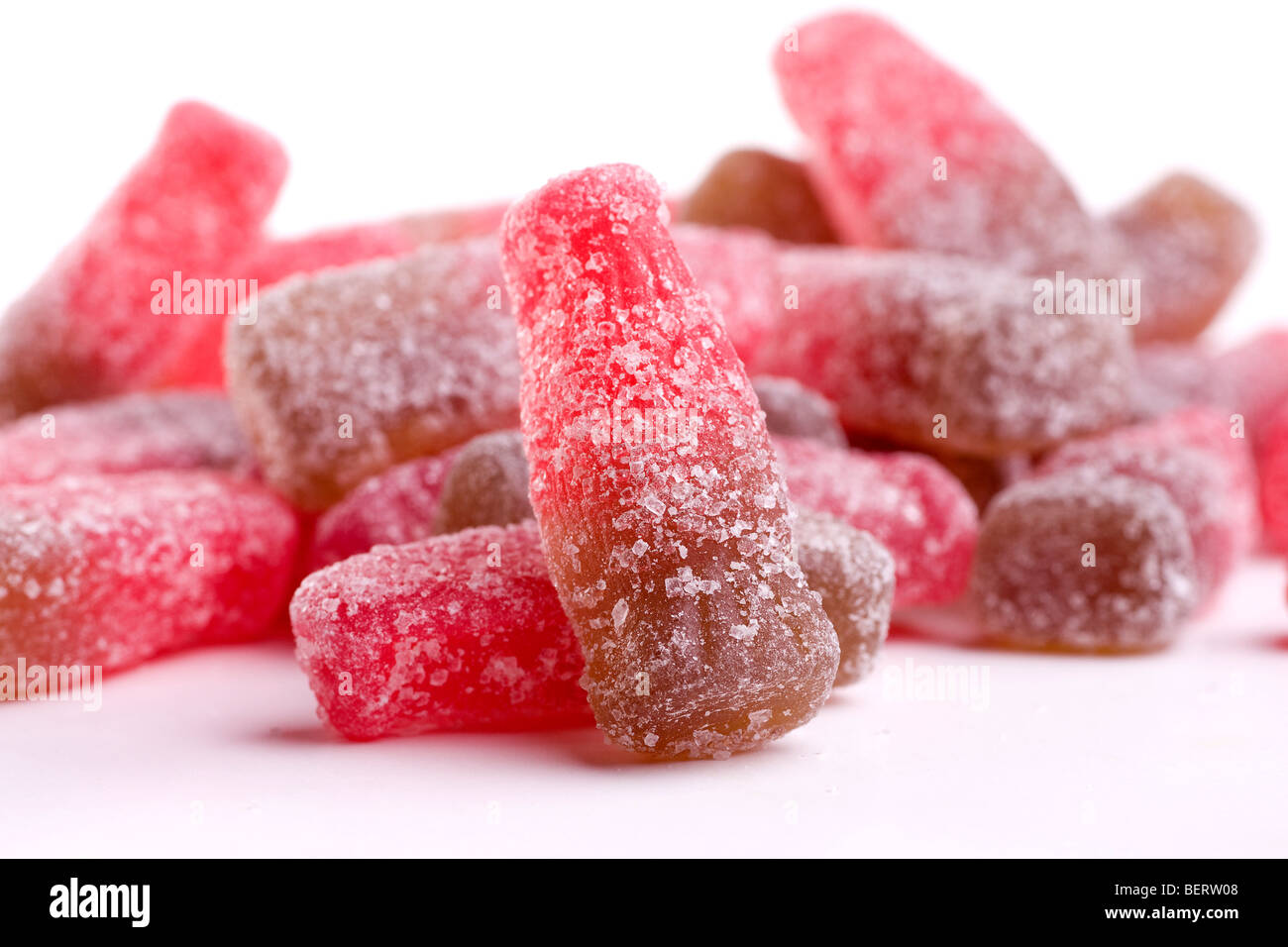 Ciliegia frizzante bottiglia di Cola caramelle: Close-Up Foto Stock