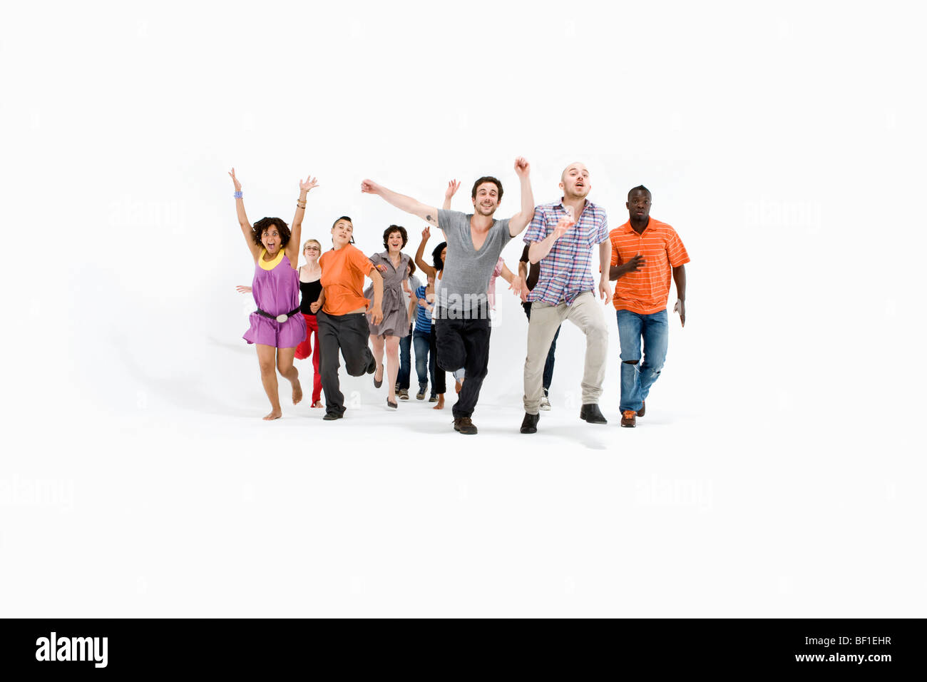 Un gruppo di uomini e donne in esecuzione Foto Stock Un gruppo di uomini e donne in esecuzione Foto Stock
