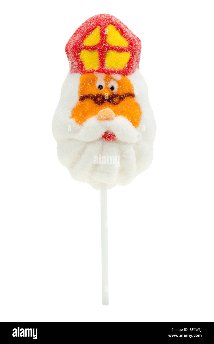 Lecca-lecca nella forma di Sinterklaas isolato su uno sfondo bianco Foto Stock
