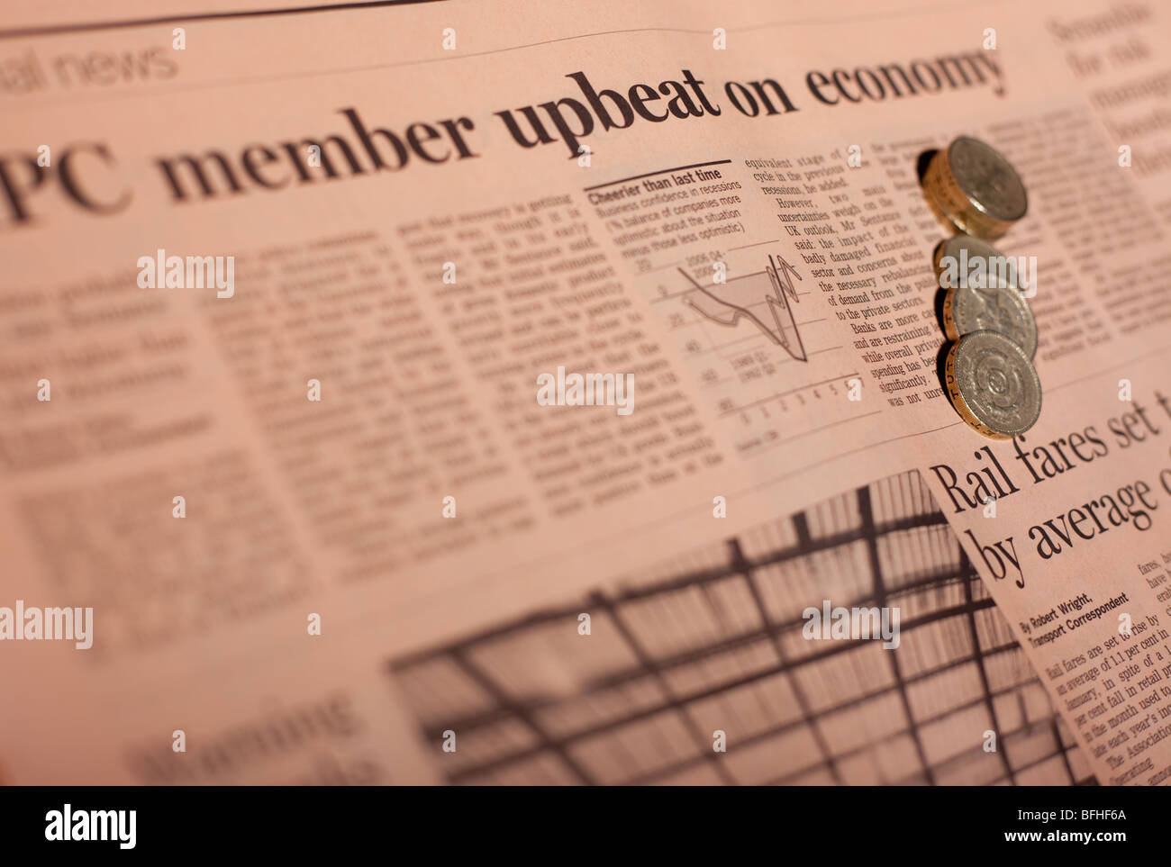 Notizie finanziarie con le monete Foto Stock