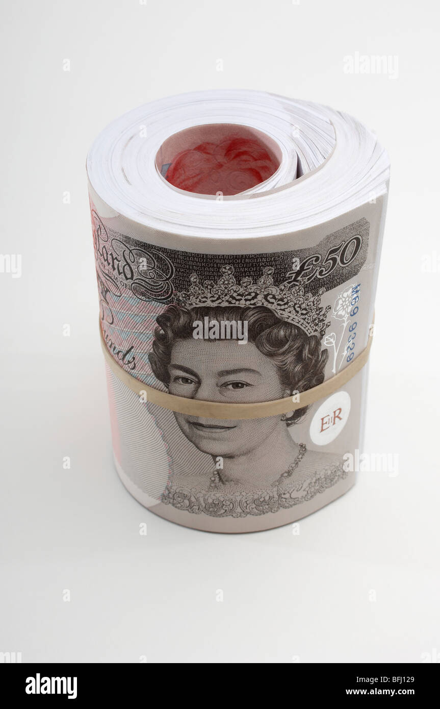 Rotolo di carta britannica valuta Foto Stock