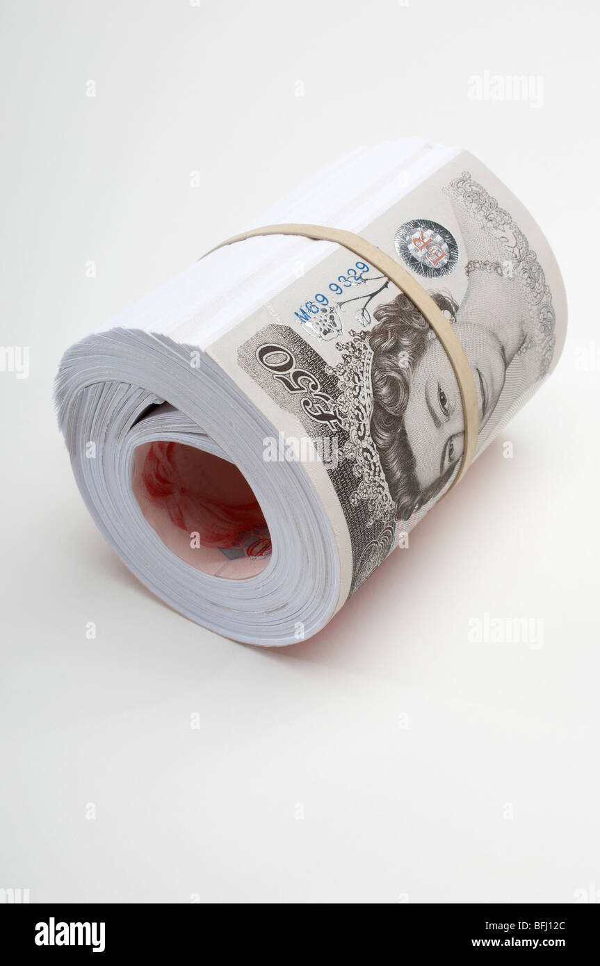 Rotolo di carta britannica valuta Foto Stock
