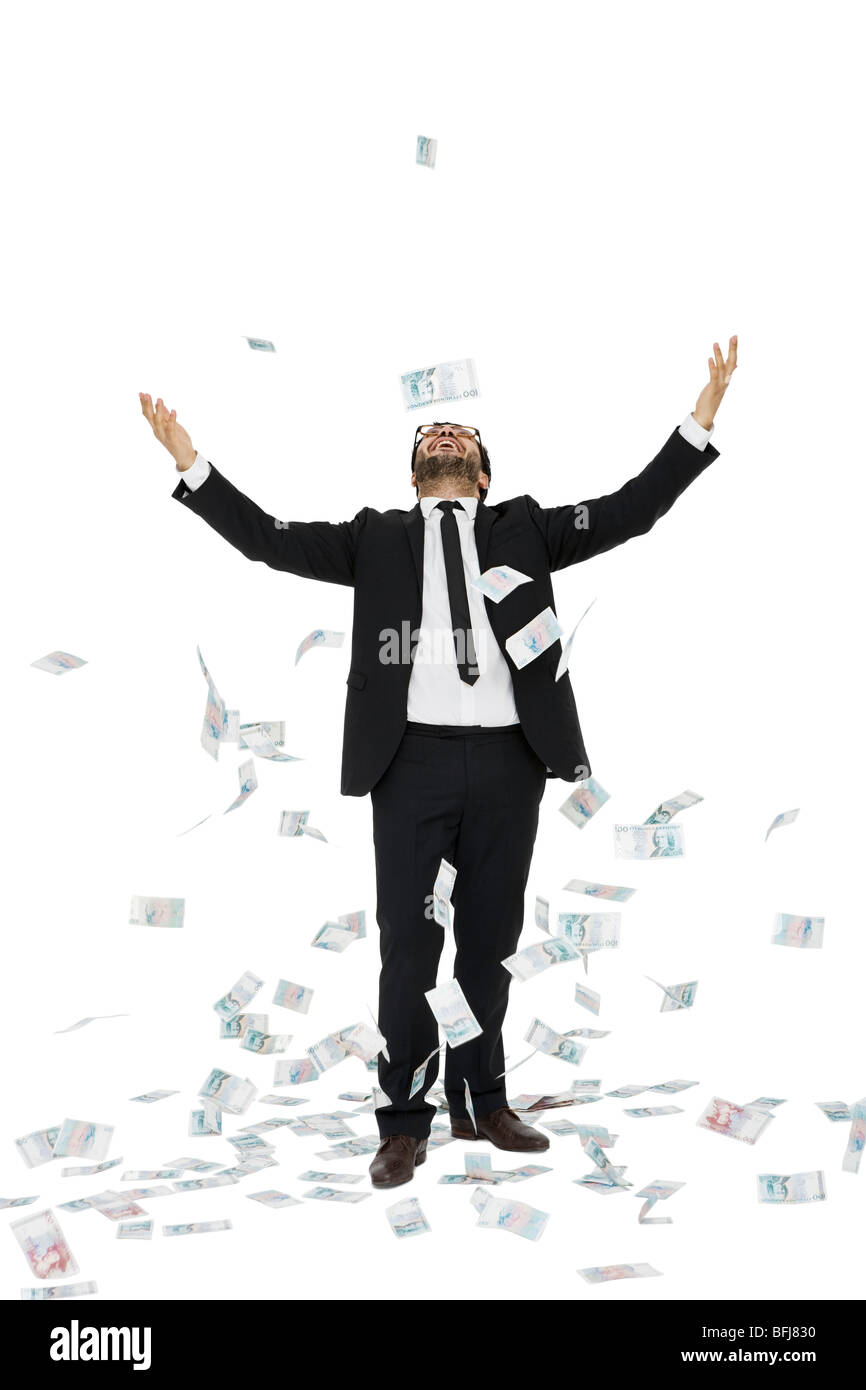 Imprenditore e un sacco di carta moneta. Foto Stock