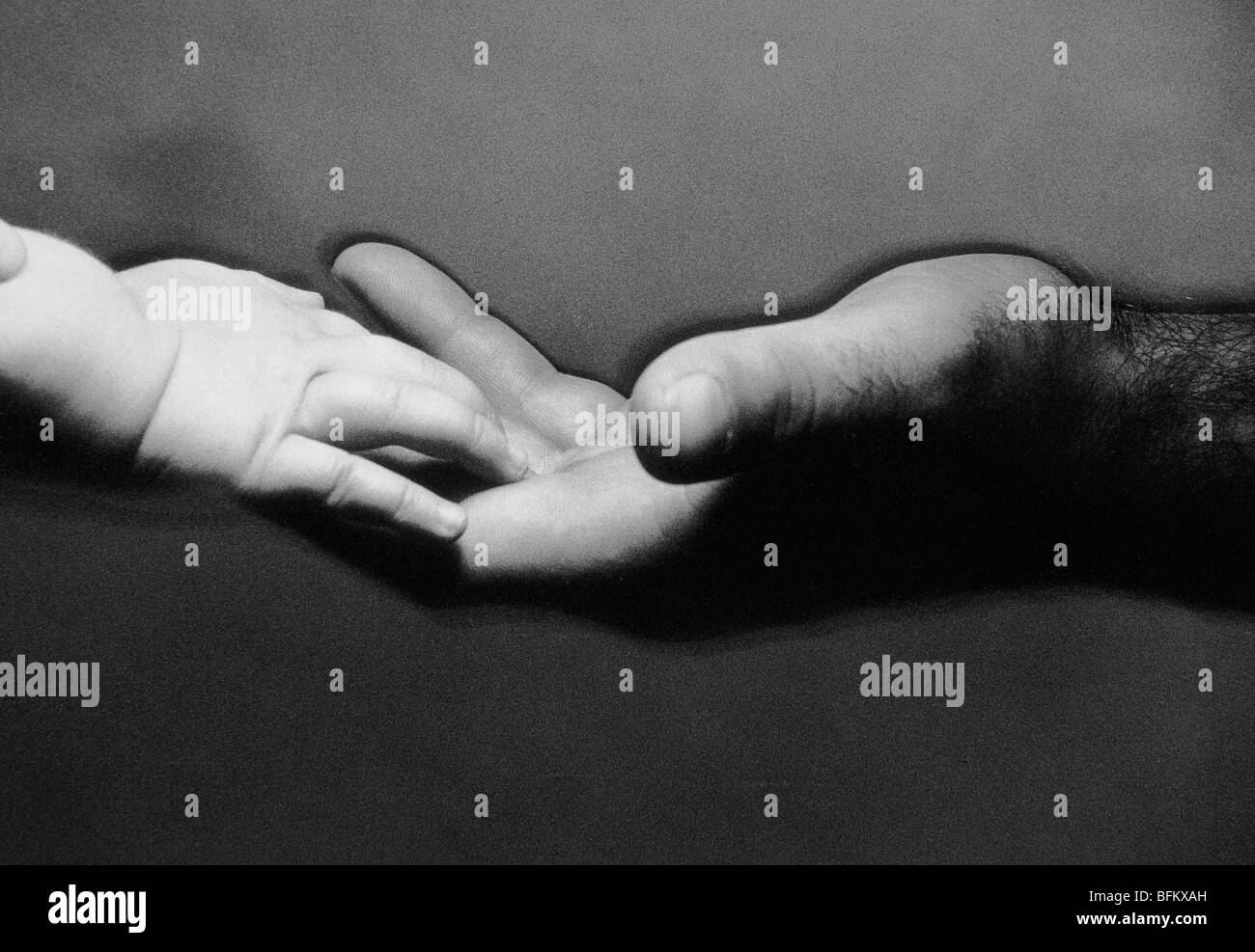 Immagine della mano per Adulti e Baby mano Foto Stock