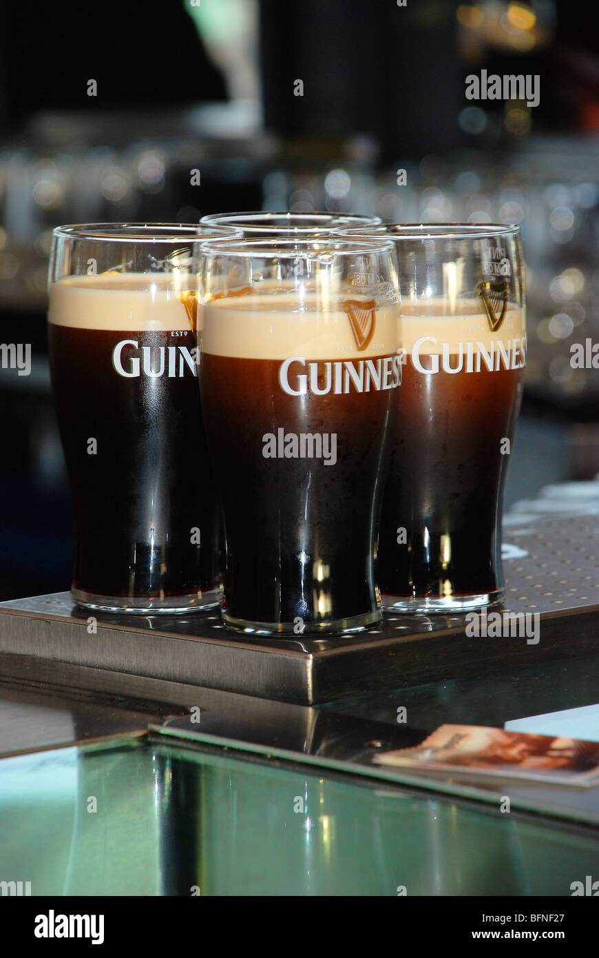 4 pinte di Guinness Foto Stock