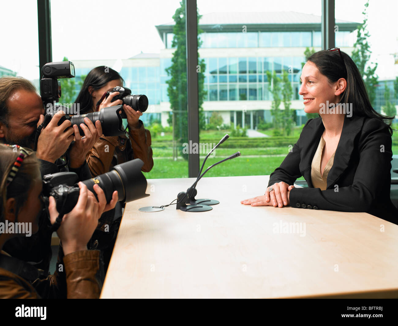Business donna dando una conferenza Foto Stock