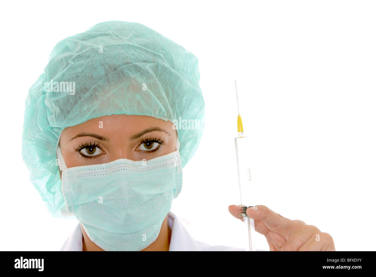Aerztin mit Mundschutz und Spritze, femmina medico con mascherina chirurgica e l'iniezione Foto Stock