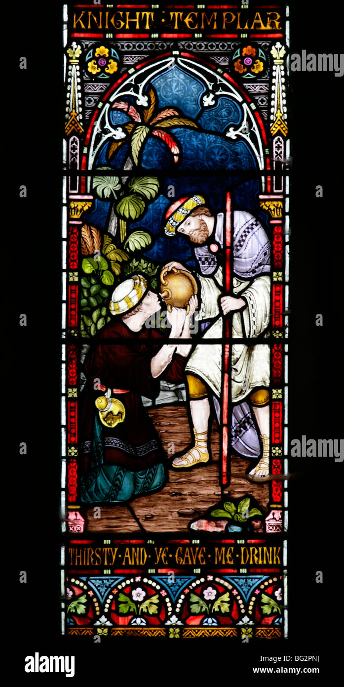 Dettaglio di una vetrata di Frederick Preedy raffigurante uno dei sei atti della Misericordia, Chiesa di Sant'Andrea, Tempio Grafton, Warwickshire Foto Stock