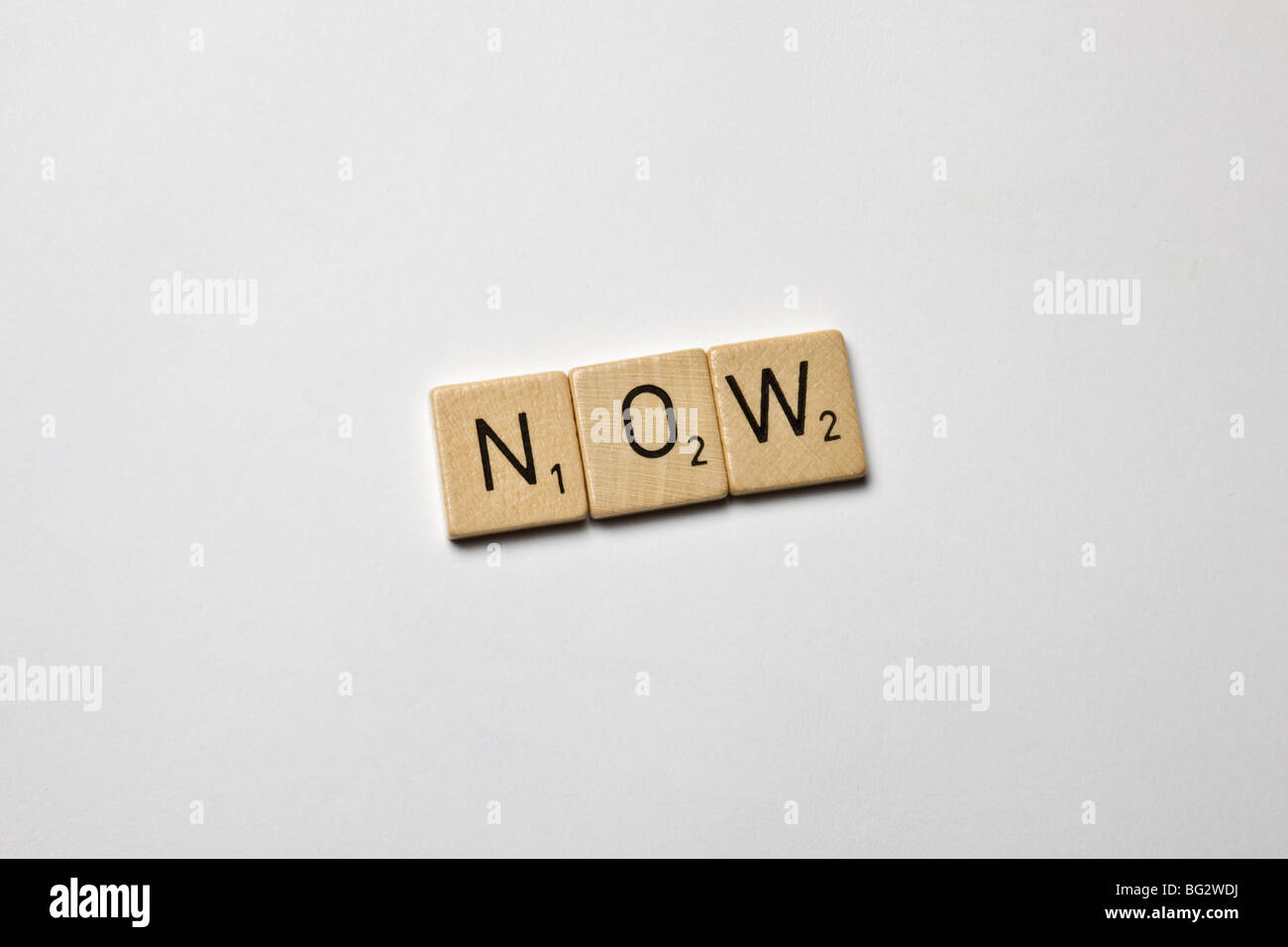 Pietre di scrabble scritto ora Foto Stock