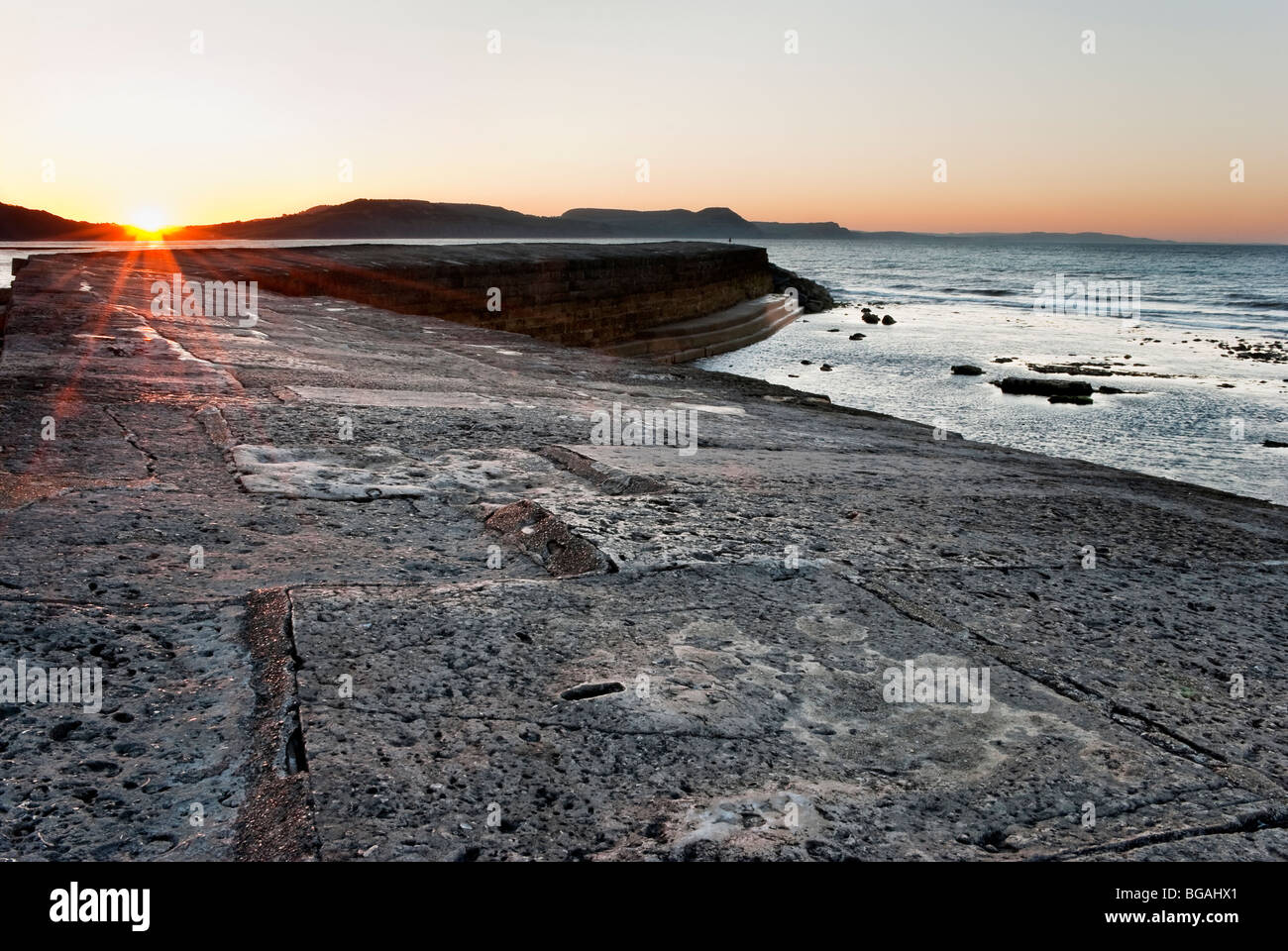 Il Cobb,Lyme Regis a sunrise Foto Stock