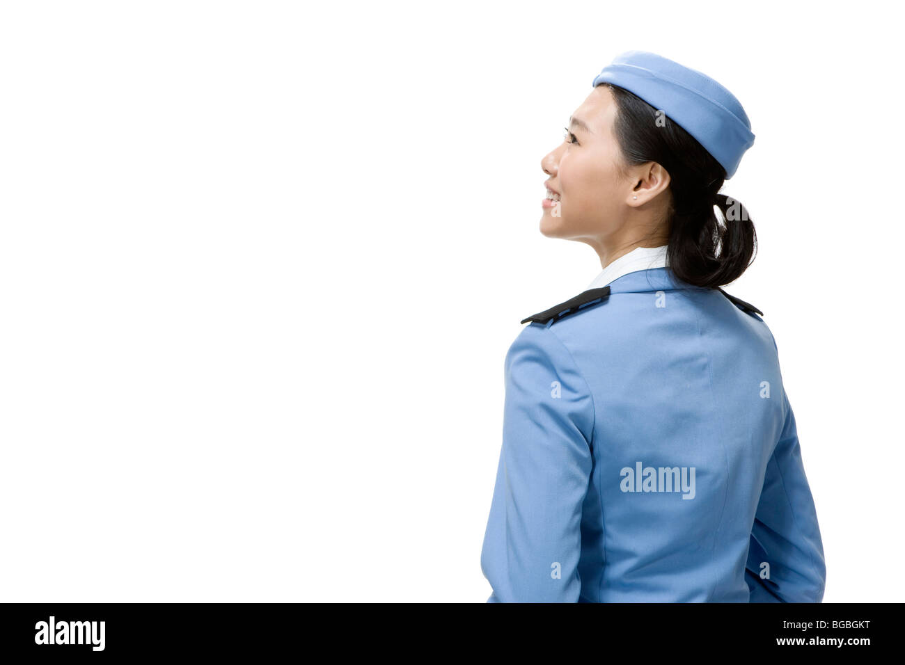 Sorridente Assistente di Volo Foto Stock