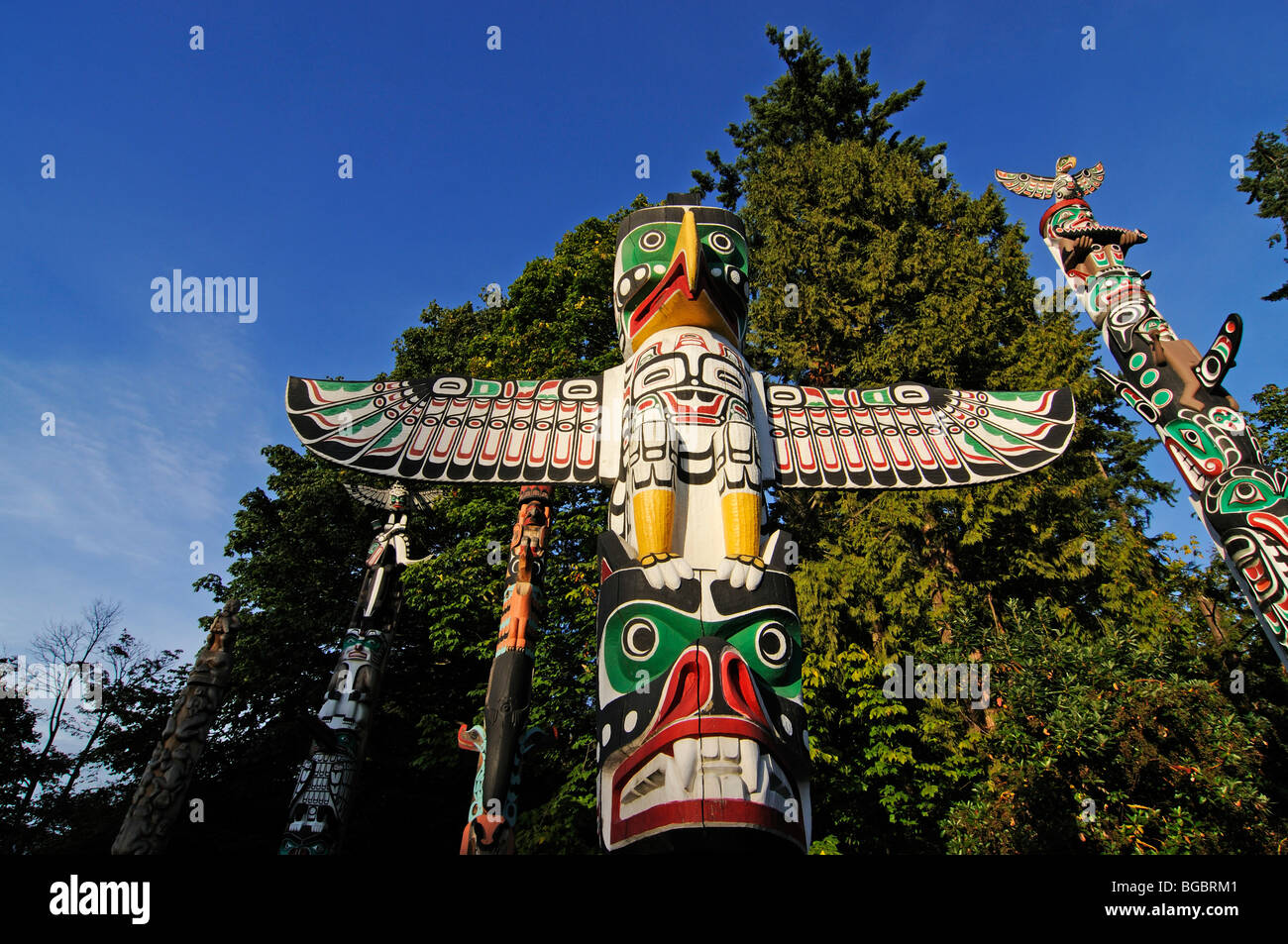 Totem Poles a Stanley Park, Vancouver, British Columbia, Canada Foto Stock