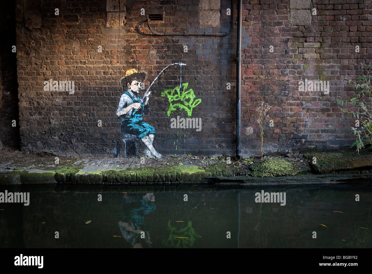 Banksy immagine di Huckleberry Finn nuovi caratteri Graffiti in Camden Lock sul Grand Union Canal Londra UK. Foto Stock