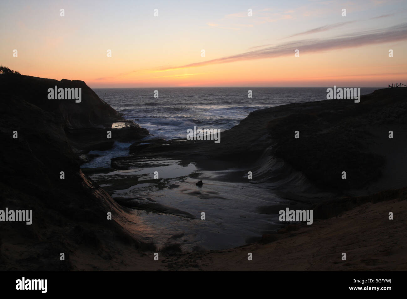 Tramonto a Cape Kiwanda in Oregon Foto Stock