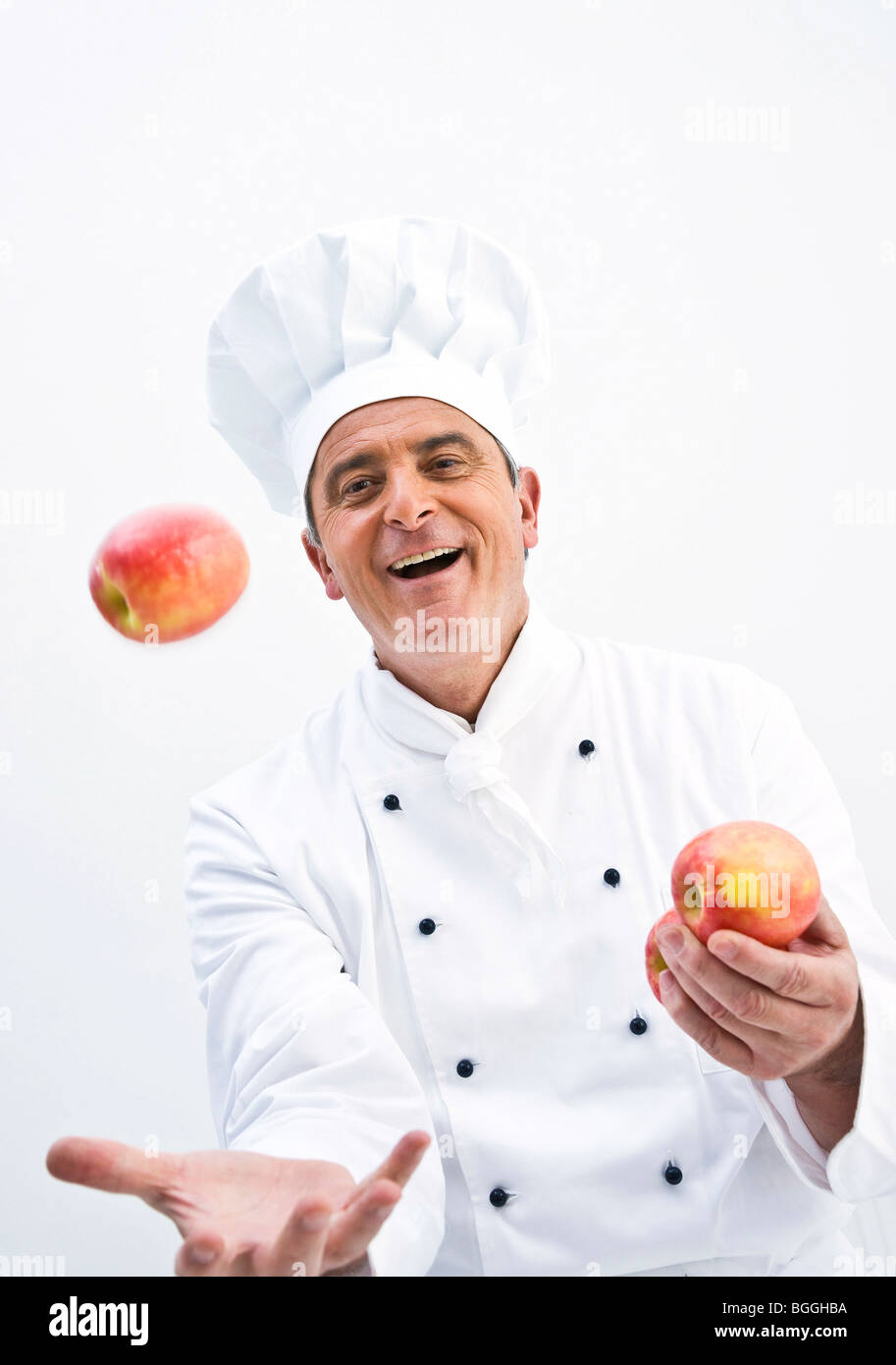 Cuocere la giocoleria con due mele, vista frontale Foto Stock