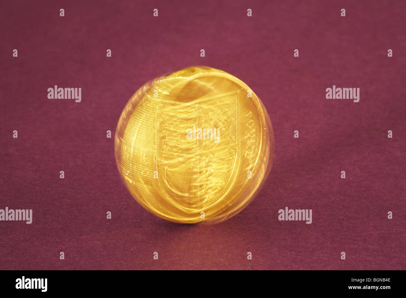 La filatura di una libbra Coin Foto Stock